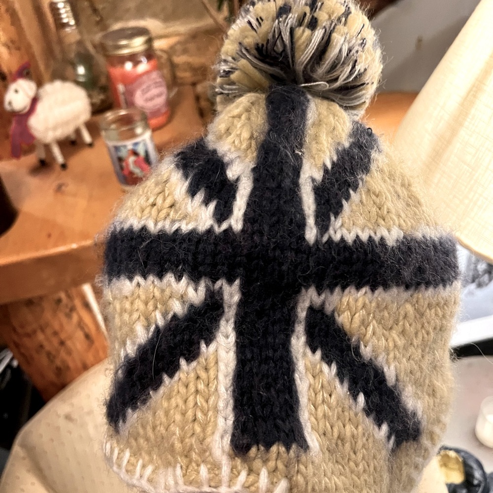 Soft, fleece-lined, Pom Beanie, with the UK flag, and ear flaps